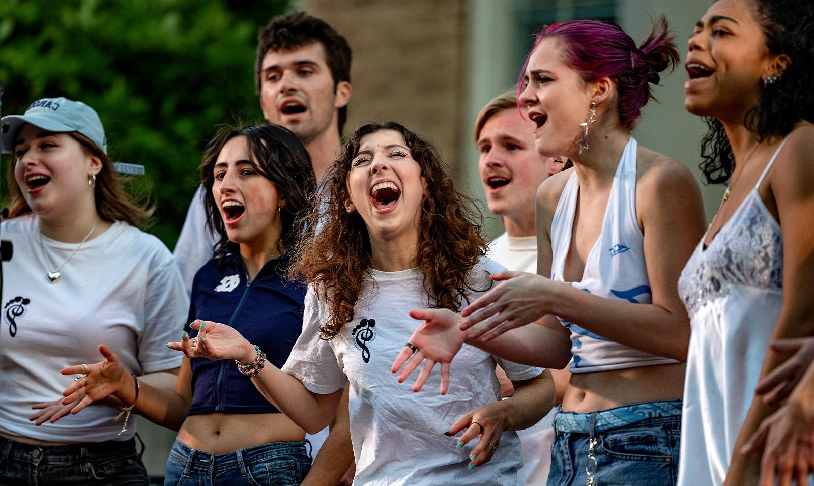 A group of students singing.