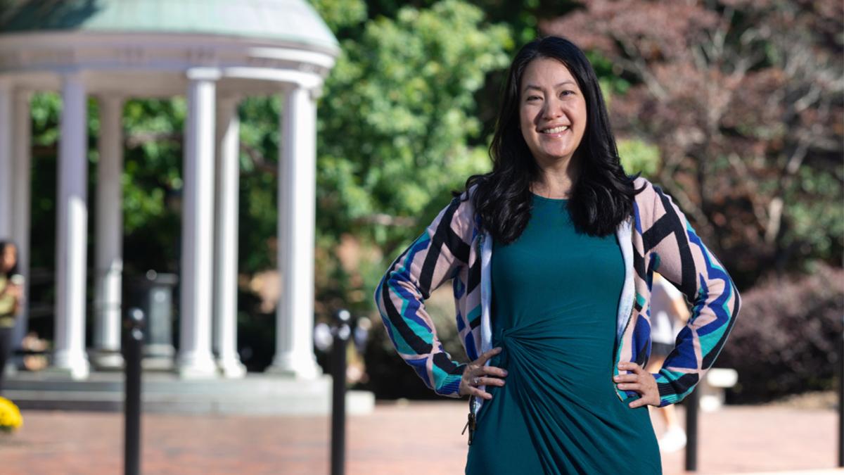 Angel Hsu posing in front of the Old Well.